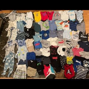 65 pieces of 0-3 baby boy clothing.